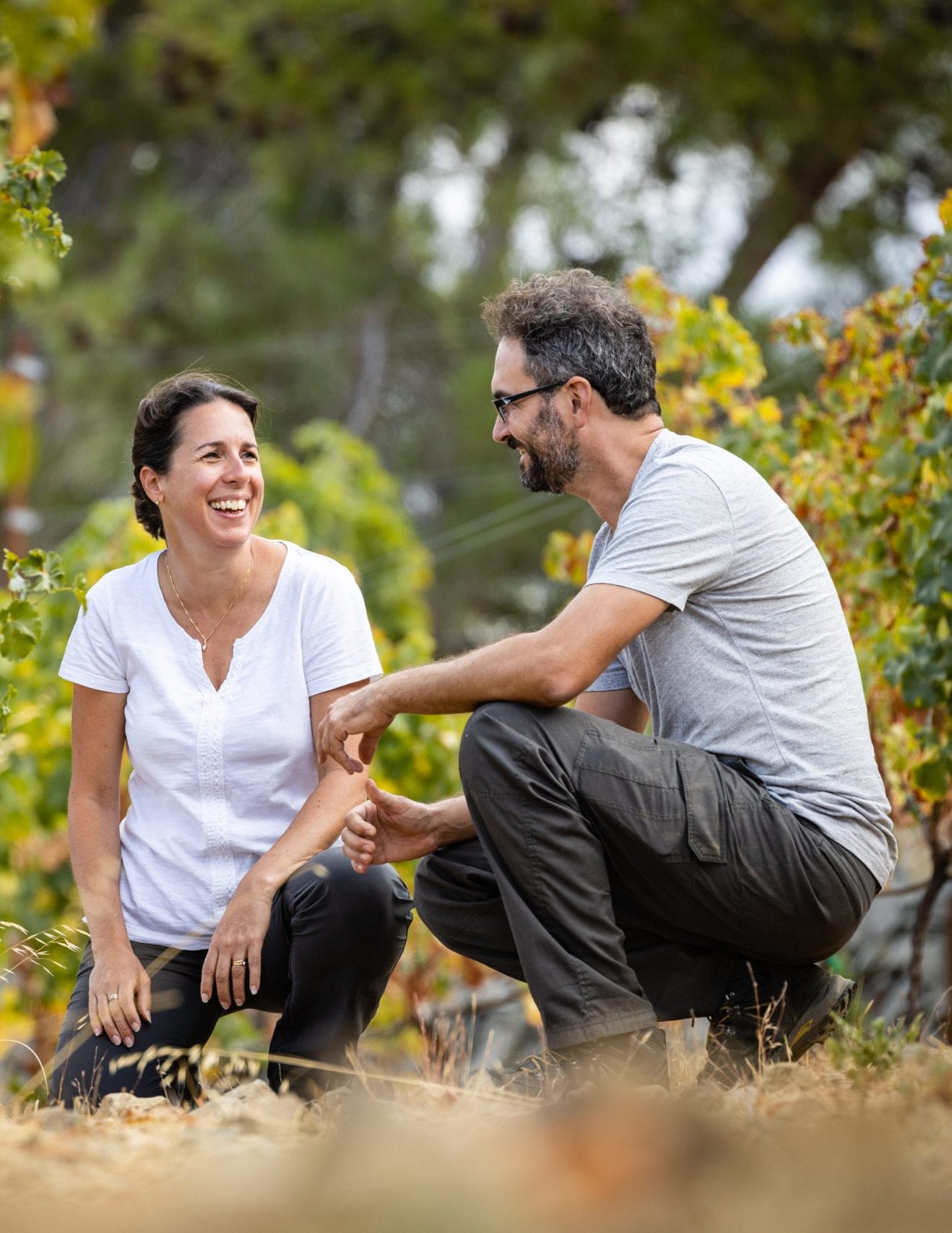 Victoras Finopoulos and Alexa Papadouris in the vineyards